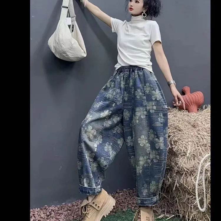 秋季新款松紧腰花朵印花拼接宽松显瘦九分哈伦女牛仔裤