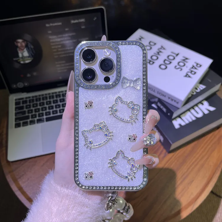 立体水钻KT猫蝴蝶结带链条适用苹果手机壳防摔全包女款网红潮牌