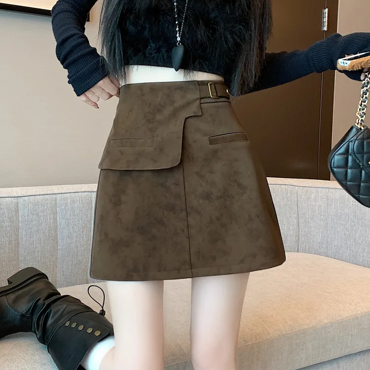 2025秋美式辣妹设计感不规则皮扣鹿皮绒包臀显瘦a字半身短裙