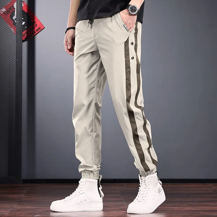 杏色冰丝休闲裤男款夏季高级感潮流运动束脚裤侧边条纹拼接速干裤