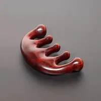 非洲紫檀半月按摩梳  尺寸：9*5*1.5cm XT312