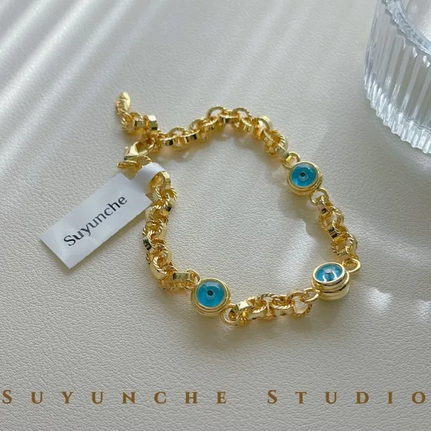 铜合金合成锆石手链 Suyunche2371个性欧美浅金色三颗蓝眼手链
