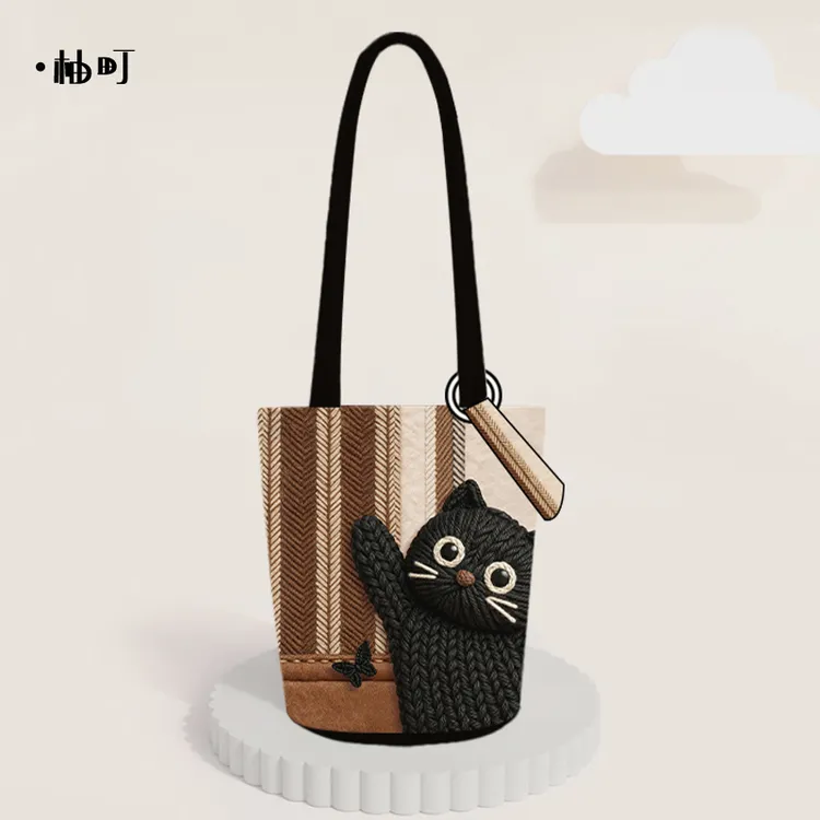 柚町午后小憩可爱潮流猫咪印花手提单肩可斜挎长水桶女士帆布包包