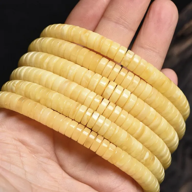 原矿蜜蜡精工隔片6mm到7.5mm，孔道1.0（有特殊要求的可以联系客服）