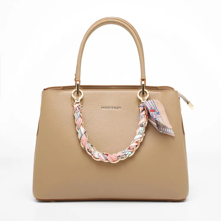 名花牛皮女士防水手提式通用撞色蝴蝶结通勤包时尚百搭