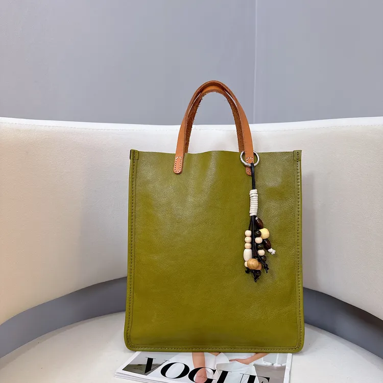 【优雅琴谱】树膏植鞣头层牛皮手提单肩斜跨时尚真皮女包#F813058