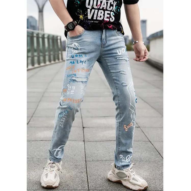 欧货高端手绘印花牛仔裤男士春夏时尚乞丐破洞水洗浅蓝色牛仔裤潮