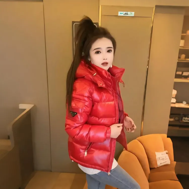 高端冬季新款棉服女长袖连帽纯色小标时尚休闲宽松加厚棉衣