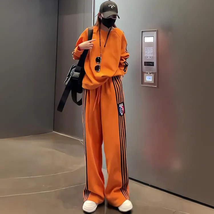 潮牌炸街橙色休闲运动套装女秋慵懒风撞色侧条纹卫衣阔腿裤两件套