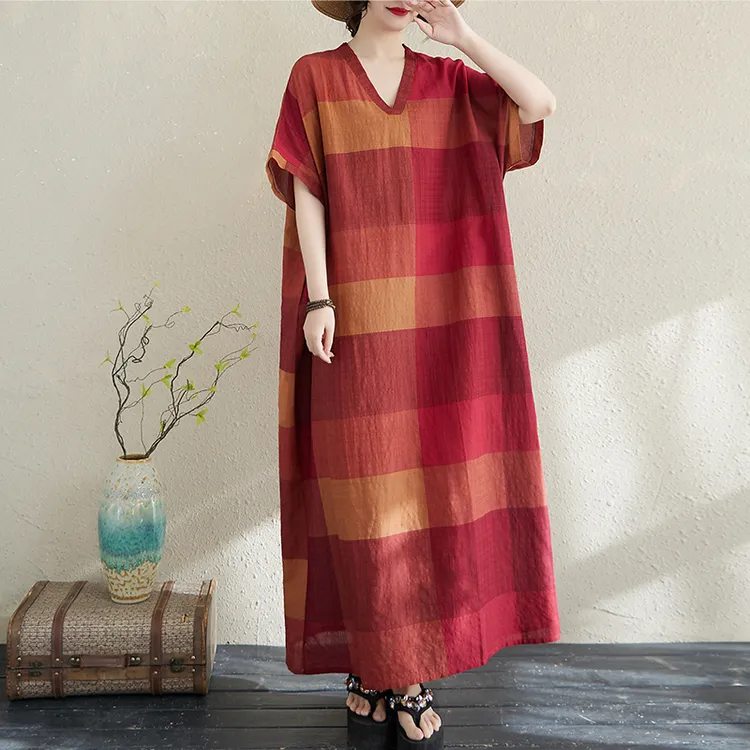 2025夏季V领棉麻大码宽松文艺度假风沙滩裙复古遮肉长款袍子女