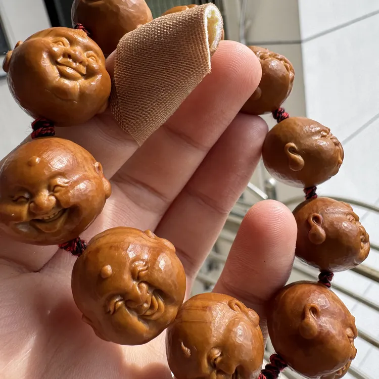 橄榄核核雕尺寸21纯刀百态手工文玩手串手持挂件精品核雕核质红润