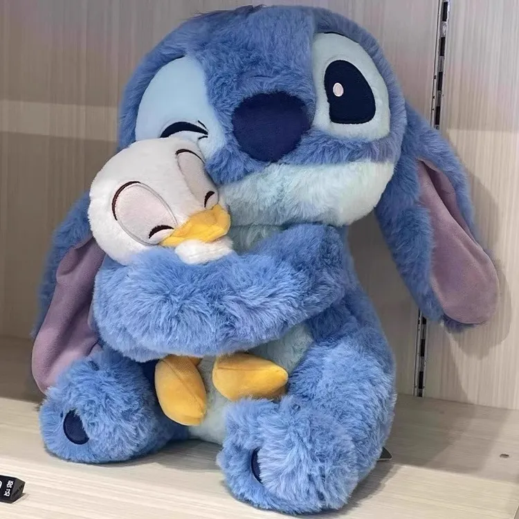 抱鸭鸭史迪仔玩偶大号可爱史迪奇唐老鸭公仔毛绒玩具生日礼物女生