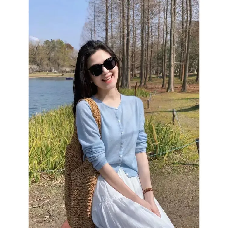 早春穿搭一整套女装2025韩系气质蓝色长袖针织开衫高腰蛋糕半身裙