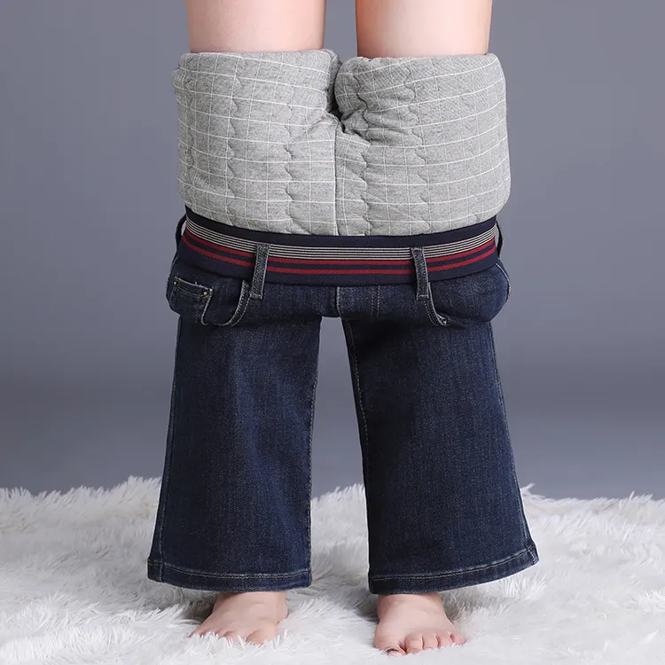 蚕丝牛仔棉裤女款爆款2025新款冬季外穿抗寒保暖微喇加厚加绒裤子