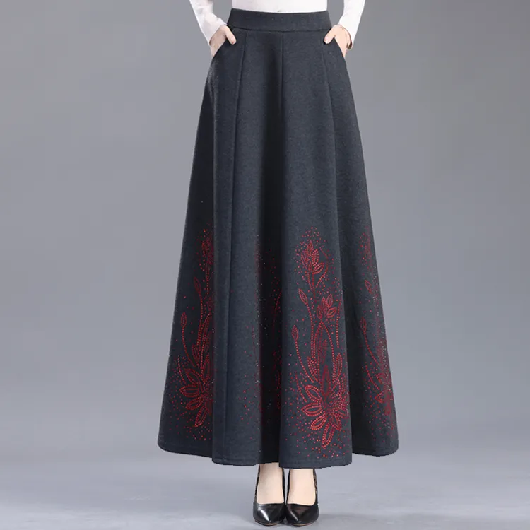 中长款烫钻设计A字伞裙女秋冬季新款时尚高级感宽松毛呢半身裙子