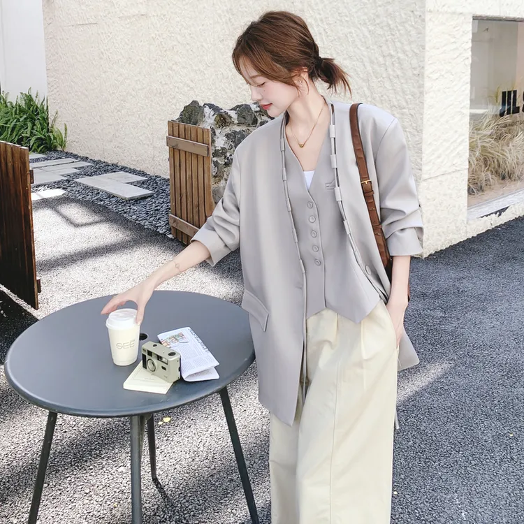 气质通勤设计感西装套装女2025秋季新款不规则飘带西装马甲两件套