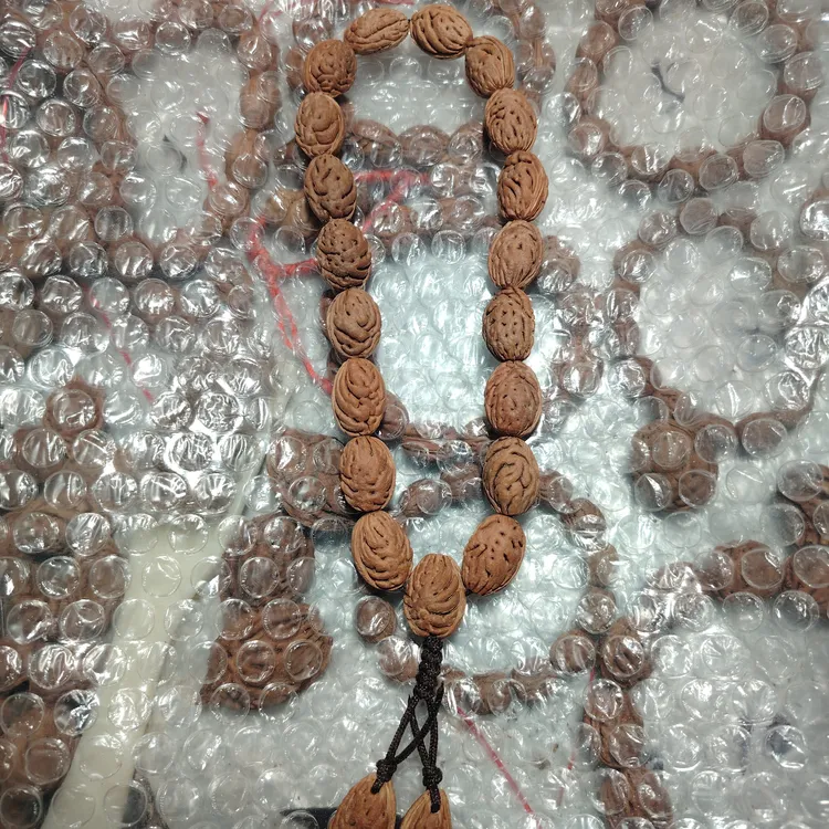 庄20+，18颗➕三通➕2弟子珠野生毛桃桃枭手串！正月份采摘！保证沉水！