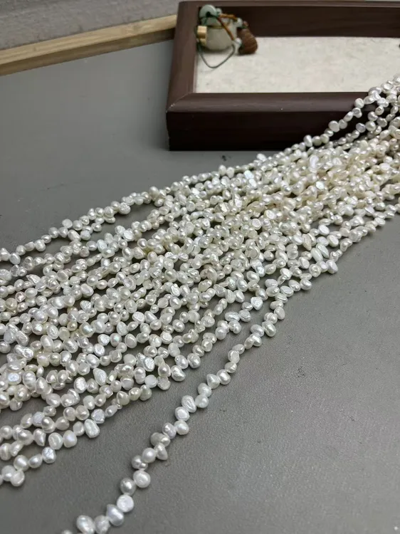 天然4-5mm左右二八孔花瓣巴洛克珍珠散珠半成品长度35cm左右可DIY
