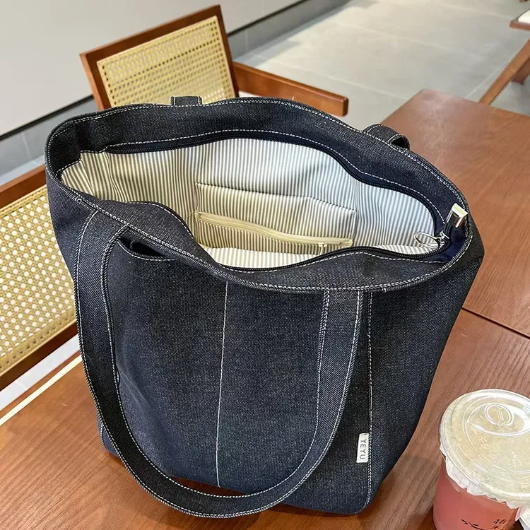 2025新款牛仔托特包简约日系单肩包竖式通勤小众单根女士防盗单肩