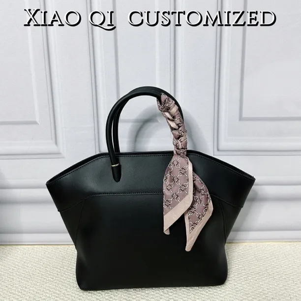 Xiao Qi进口牛皮大容量手提包时尚小众翅膀包通勤百搭托特包轻奢