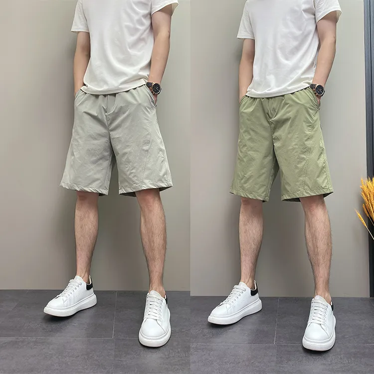 2025年夏季薄款潮流韩版痞帅宽松哈伦速干纯色青年男士休闲四分裤