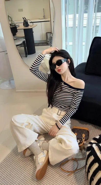 2025早春新款设计感小众超好看一字肩条纹针织毛衣女百搭直筒裤