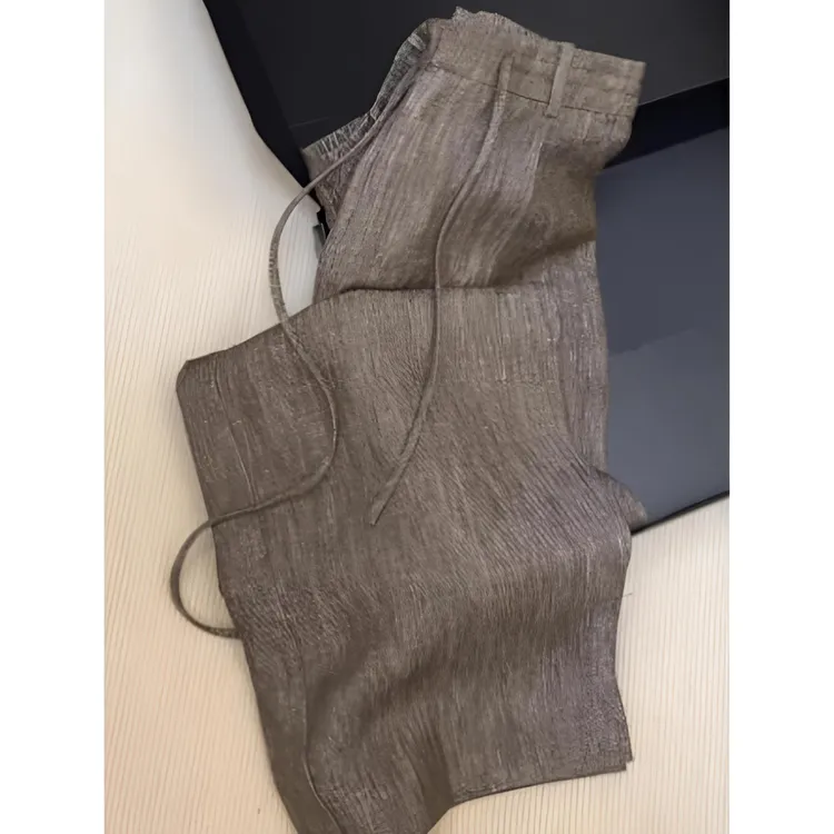 轻奢高端松弛感系带休闲裤子女2025年早秋复古时髦慵懒咖色阔腿裤