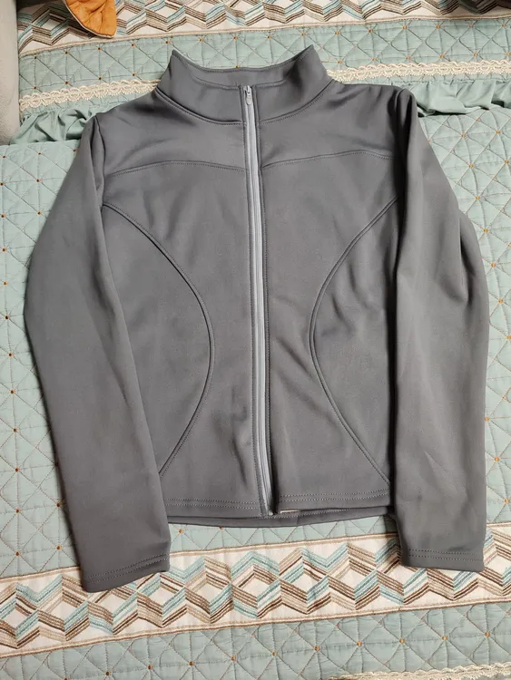 休闲风保暖跑步防风外套时尚户外秋冬女士纯色长袖短外套