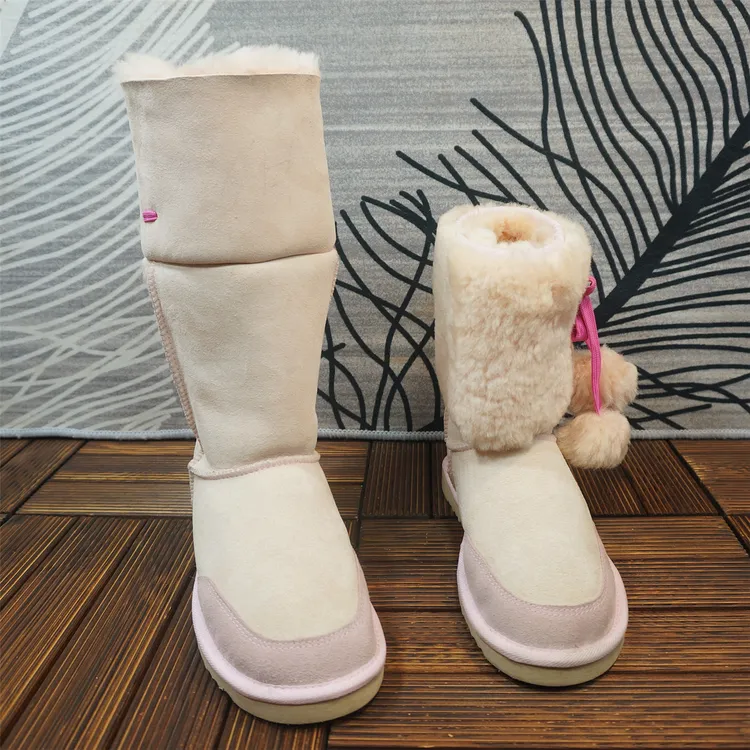 秋冬新款真皮羊皮毛一体雪地靴中筒毛球保暖棉靴两穿棉鞋69-3