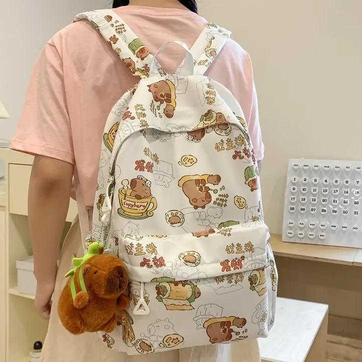 尼龙高颜值书包女小学生可爱卡通双肩包初中生ins日系大容量轻便