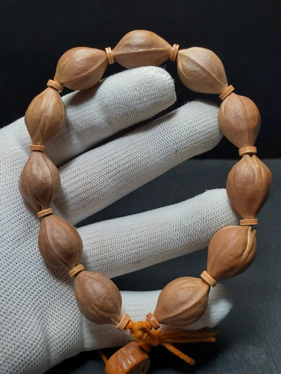 广东梅林直心铁核三面佛1.5＊2.3左右十颗＋1颗，正宗梅林老铁核！