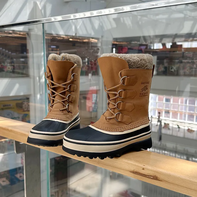皮毛一体户外登山防水防滑滑雪系带猎鸭靴羊毛加厚滑雪地靴子