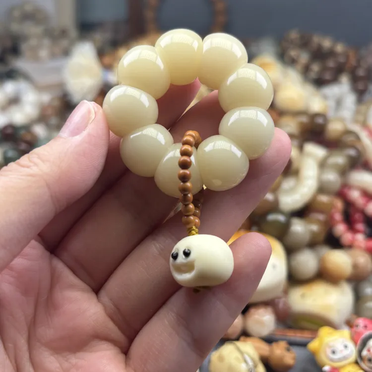 奶黄色搭配馒头仔可爱小手捻太阳花文玩