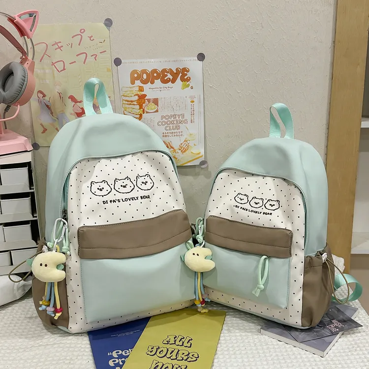 可爱小清新书包女新款小熊波点拼色百搭双肩包学生书包旅行小背包