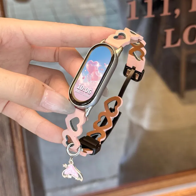 适用小米手环10表带9/8爆款鱼尾镂空爱心折叠扣皮质7/6/5替换腕带