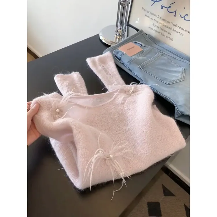 2025早秋新款粉色镂空钉珠针织衫毛衣女士上衣设计感小众韩系穿搭