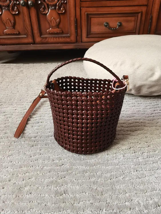 牛皮纯手工编织腋下女士手提包水桶包斜挎包单肩包休闲时尚编织包