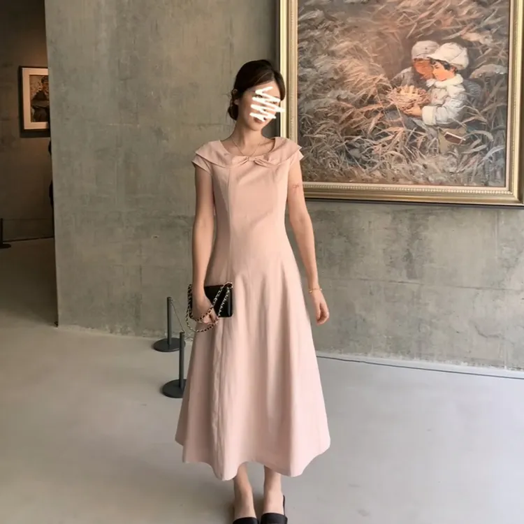 设计感连衣裙女2025夏季新款法式高级感蝴蝶结无袖收腰中长款裙子