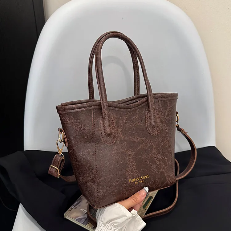 高级感百搭手提水桶包2025新款潮质感休闲单肩斜挎包小众设计女包