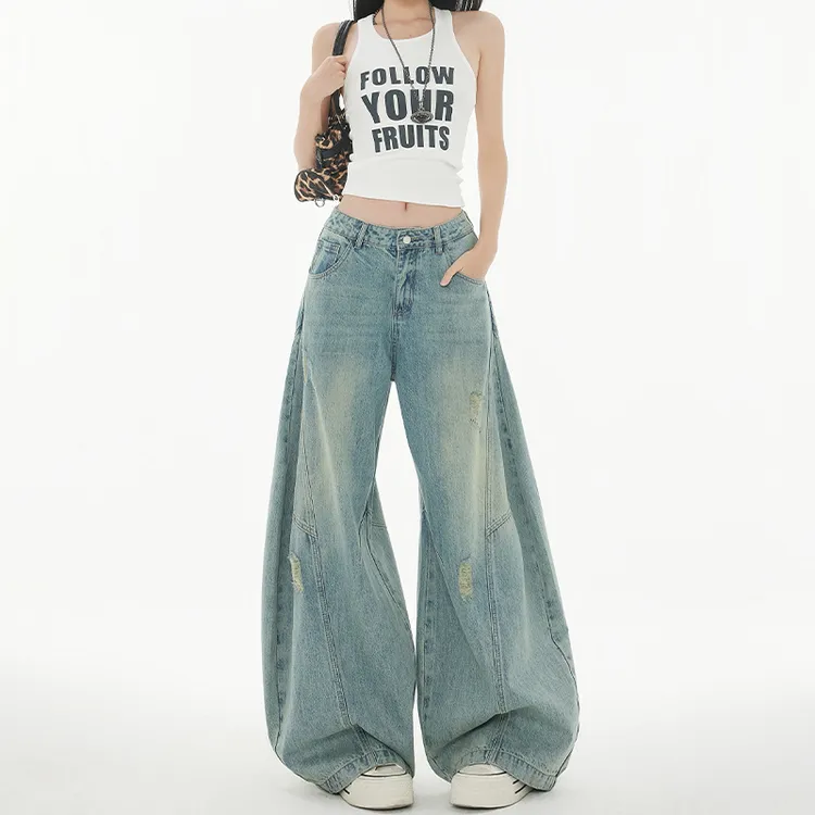 美式高街解构宽松弯刀牛仔裤女2025秋冬新款拼接磨破休闲阔腿长裤
