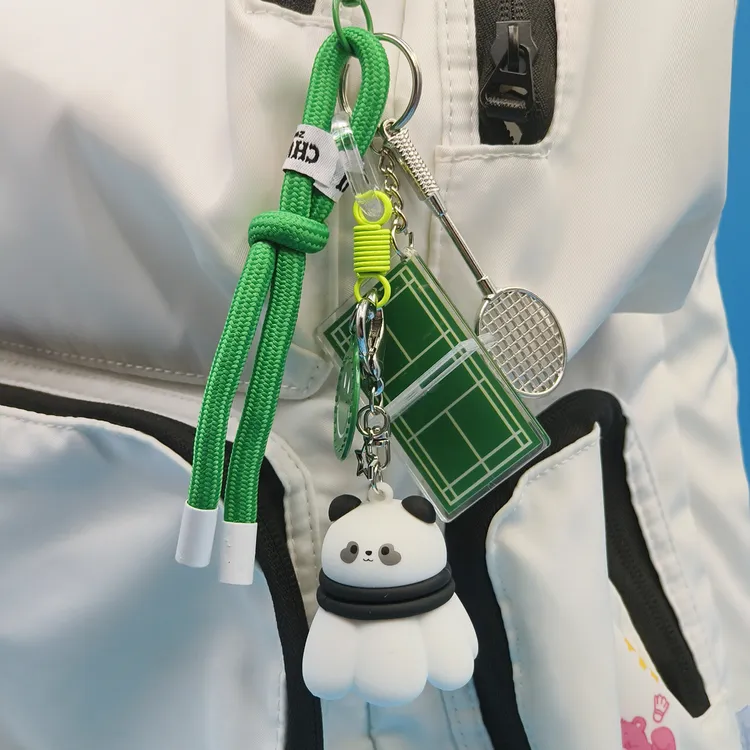 创意卡皮巴拉熊猫旋转羽毛球公仔钥匙扣羽毛球包挂件饰品情侣礼品