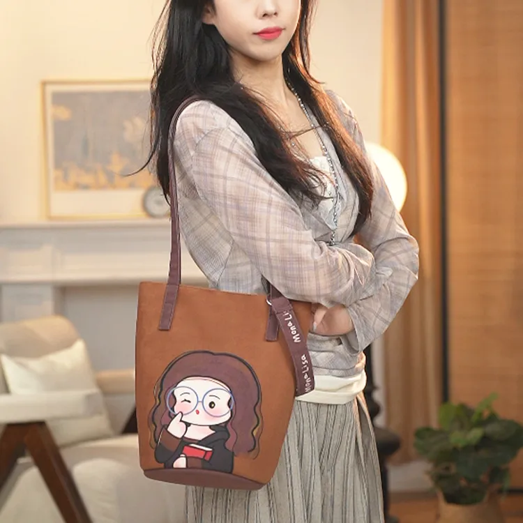 艺术鸭设计师原创戴眼镜的蒙娜丽莎棕色版水桶包单肩斜挎通勤女包