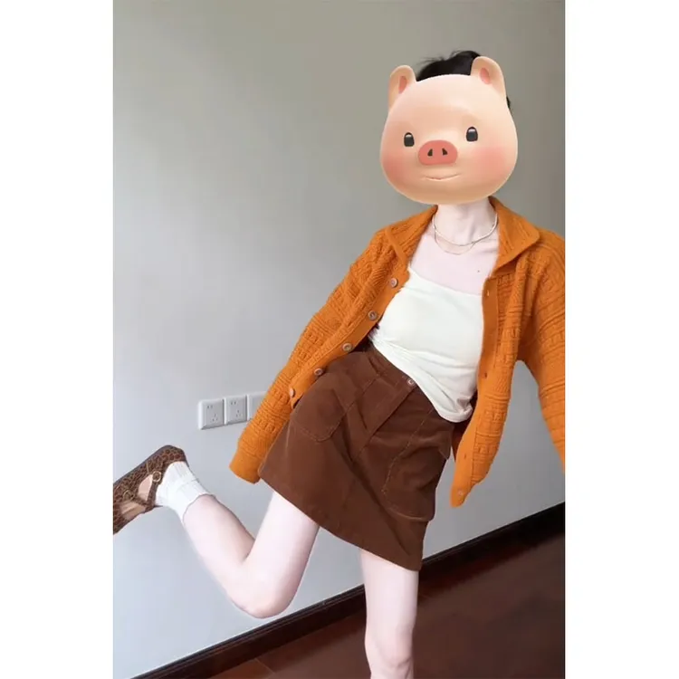 时尚穿搭女士秋季翻领长袖排扣针织开衫上衣复古法式包臀半身裙