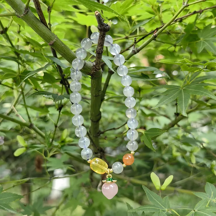 天然爆闪灰月光单圈桃子手链