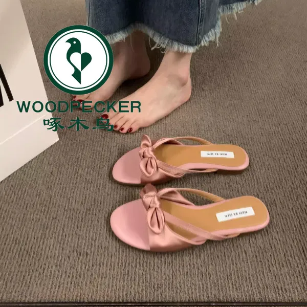 啄木鸟平底粉色仙女风小凉拖鞋女外穿2025新款夏季蝴蝶结度假凉鞋