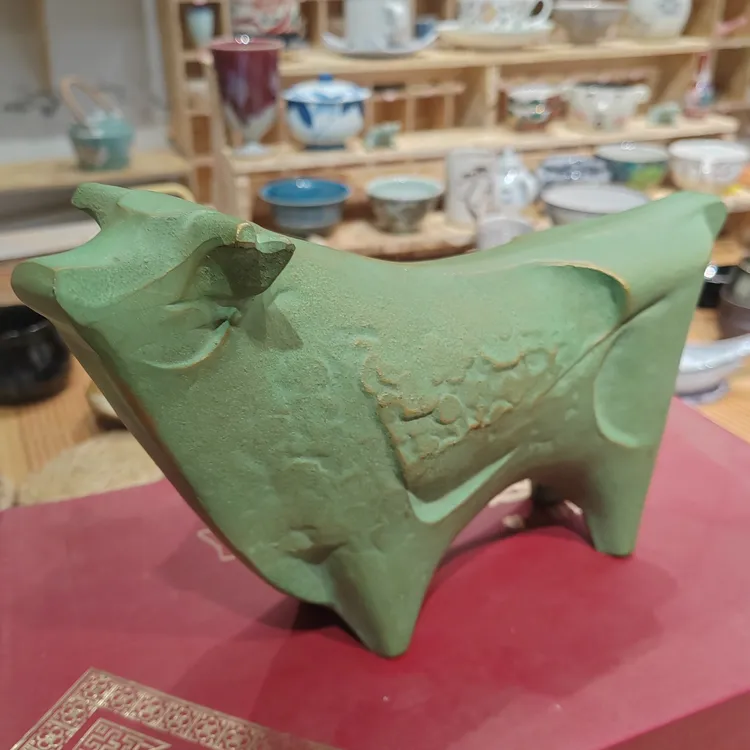 24.5*15绿色花纹铁牛