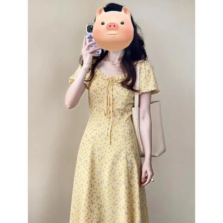 优品多巴胺穿搭法式黄色碎花连衣裙子女装新款绝美长裙小个子