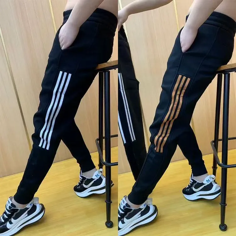 秋季新款空气层男士潮流条纹运动裤百搭裤束小脚修身脚裤休闲裤