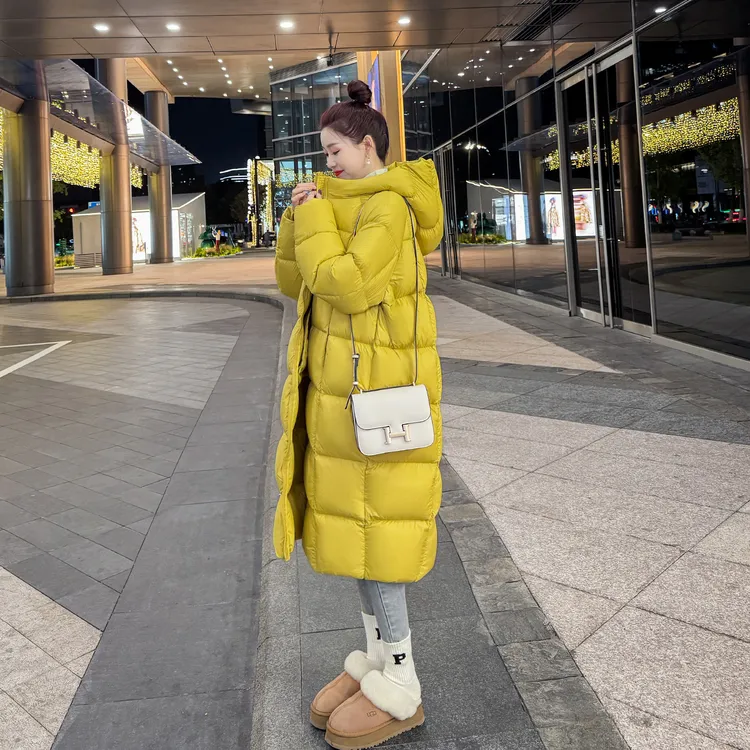 黄色羽绒服女长款过膝2025冬季新款今年流行加厚保暖极寒气质外套