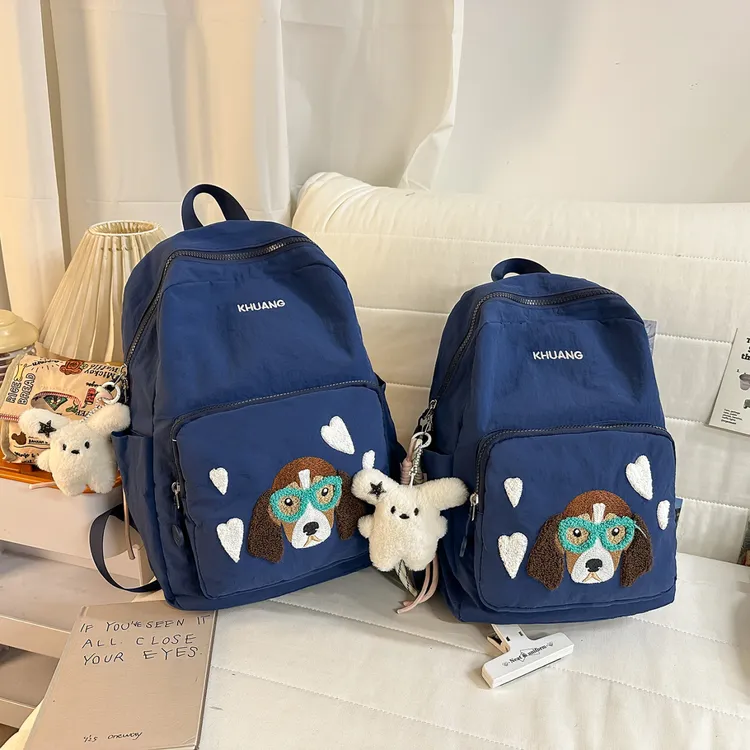 简约纯色休闲百搭书包可爱卡通刺绣双肩包女日常轻便旅游小背包男